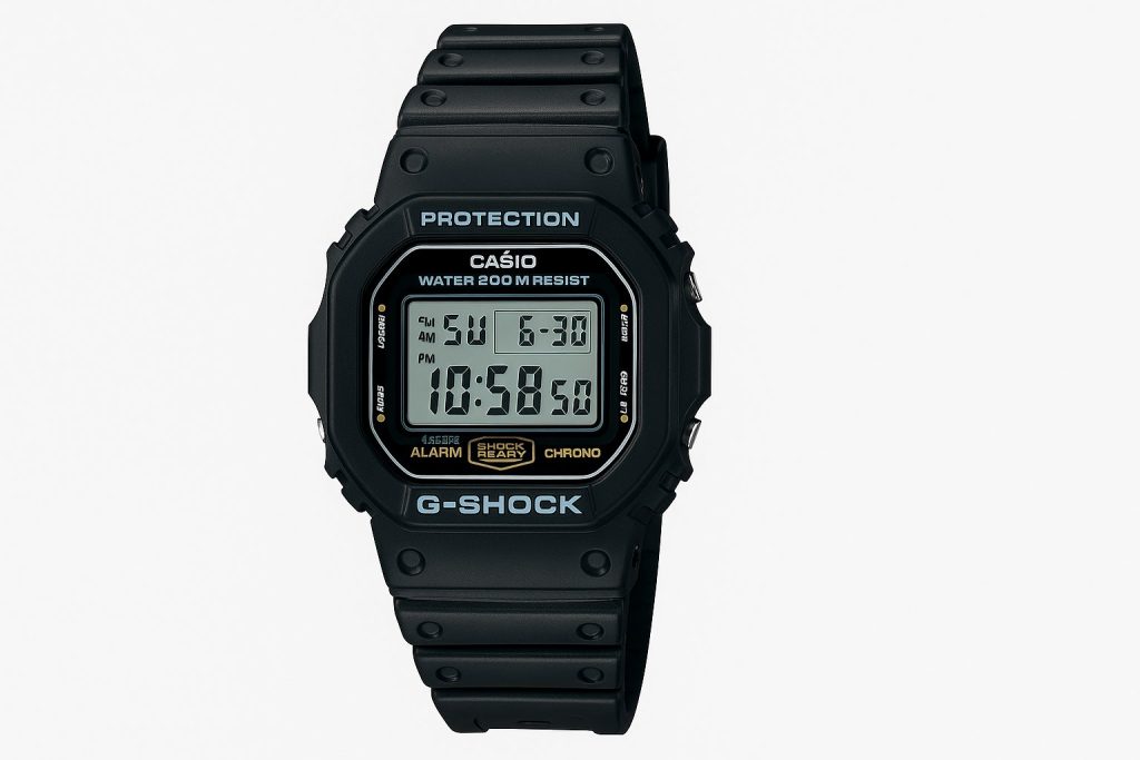 Защо G-Shock Остава Ненадминат? История и модели 2 Дигитален часовник Casio G-Shock DW-5200C с черен корпус и класически дисплей, изобразен върху бял фон