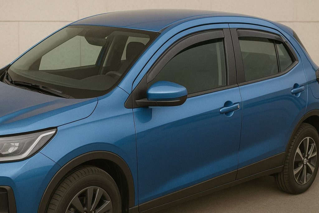 Син SUV с тъмен ветробран над прозорците, заснет отблизо от страната на шофьора.