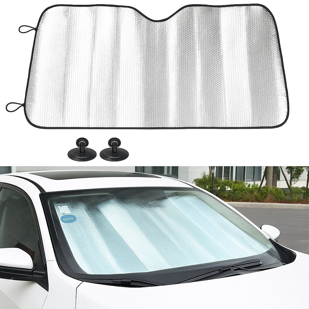 Сребрист сенник с размери 130x60 см е поставен на предното стъкло на бял автомобил, показан с вакуумни приставки и разгънат изглед